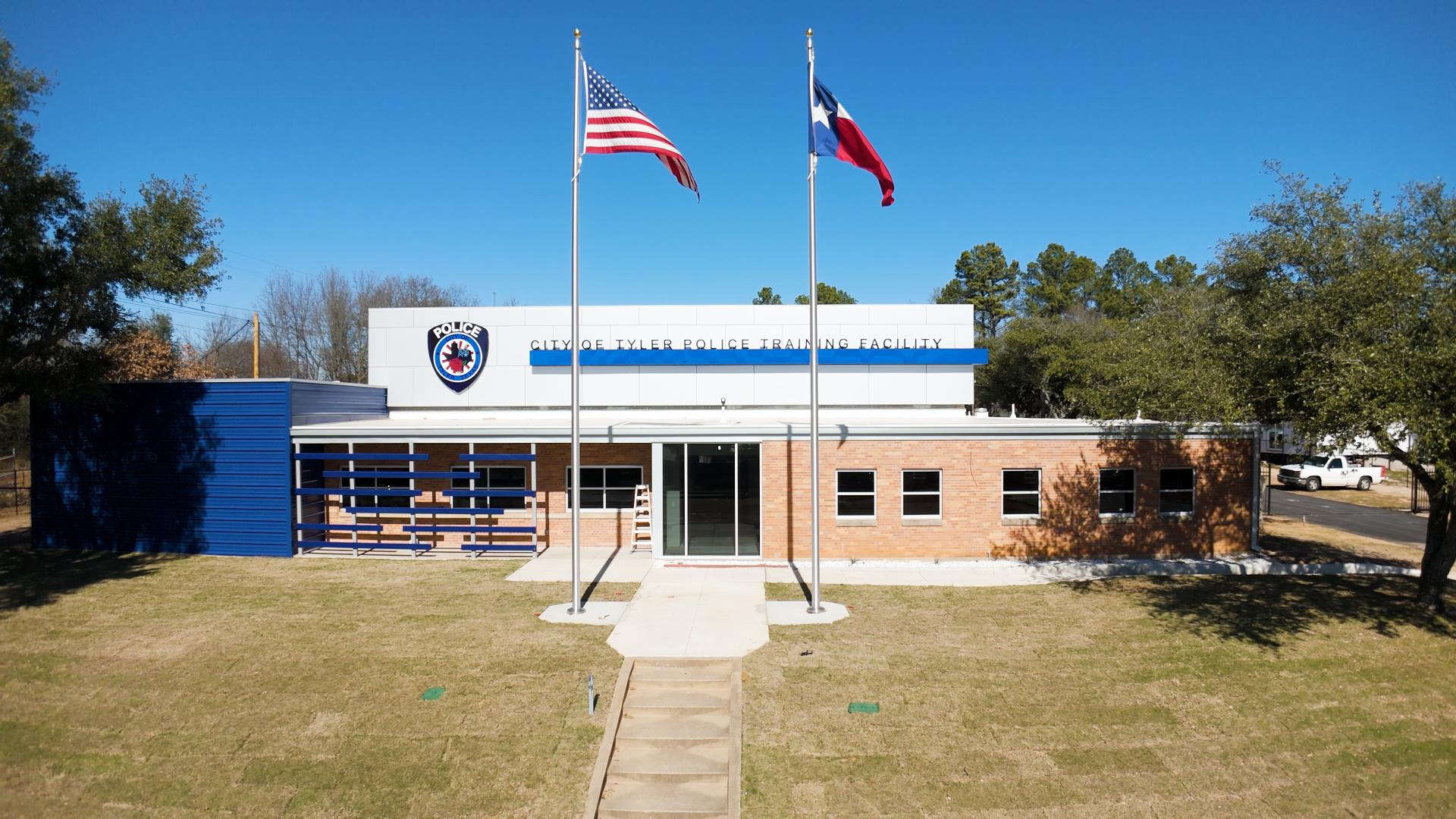 Exterior photo of the City of Tyler Police Training Facility on a sunny day.