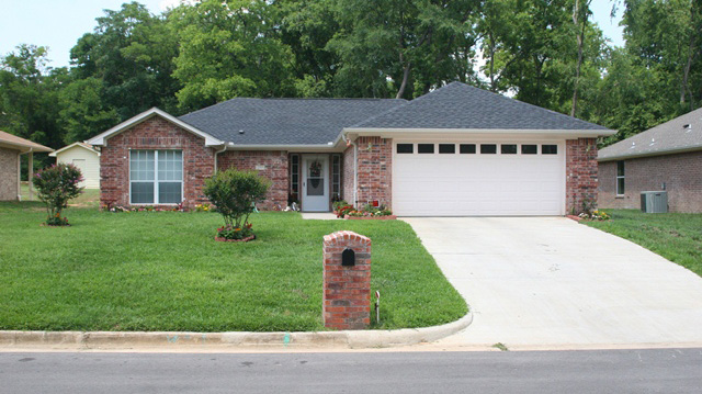 Curb view of another house